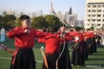 University students perform traditional ritual of archery